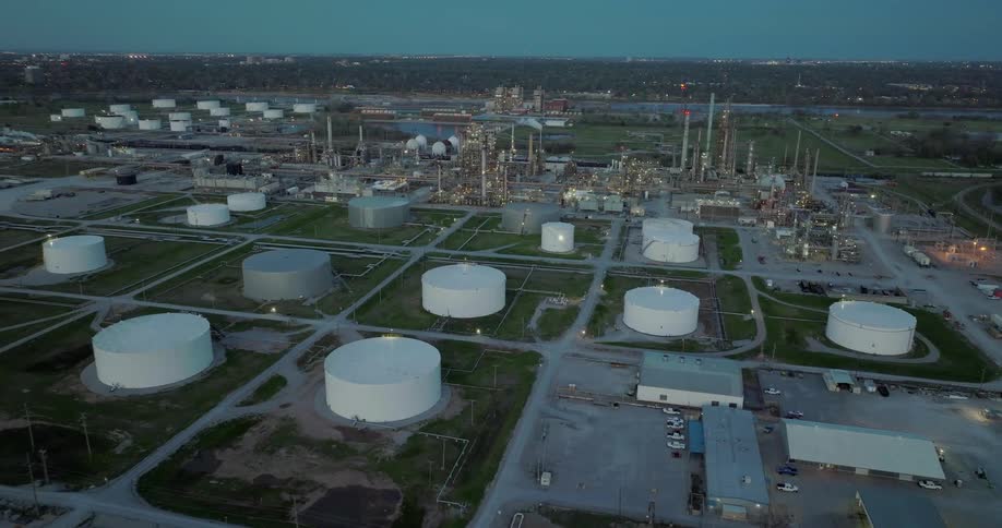 Storage tanks at refinery cover several fields around plant