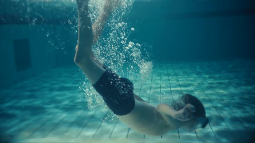 A child swimming in a pool