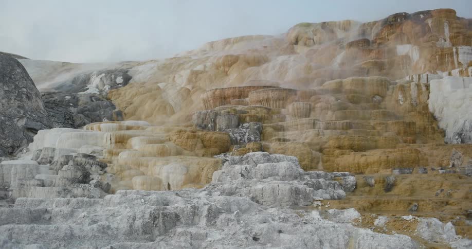 Aerial view of snow covered mountain landscape is displayed