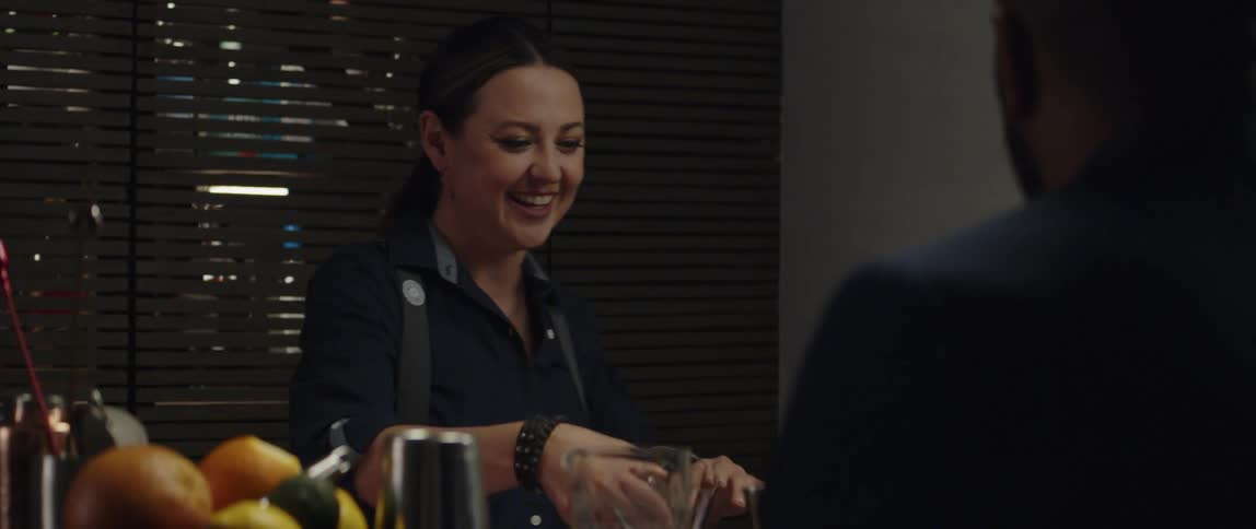 Two friends are hanging out and drinking together