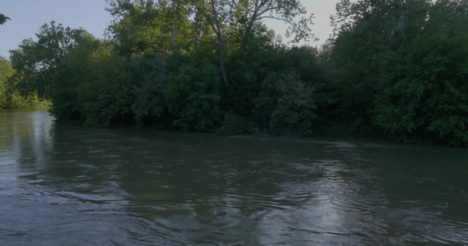 A river near flows through a forested area