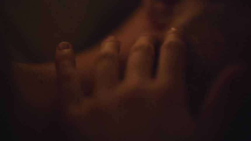 A woman is touching a man with her fingers