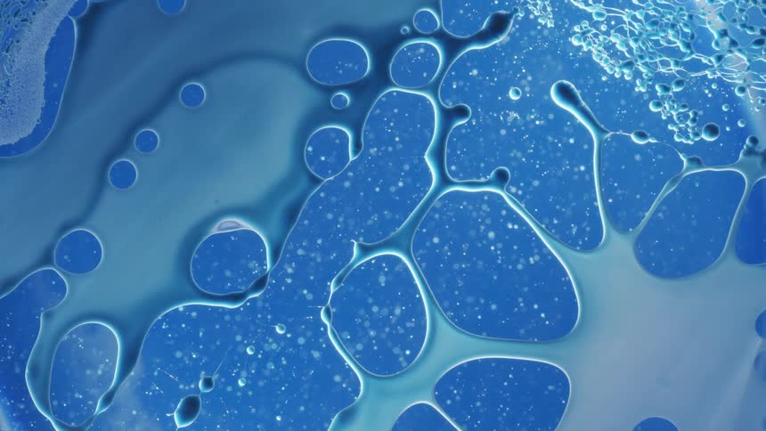Film over bluish fluid evaporates and coagulates leaving large holes