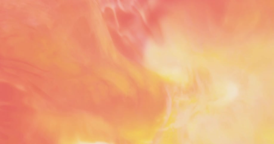 Abstract shapes of orange an yellow smoke slowly revolving on the wind