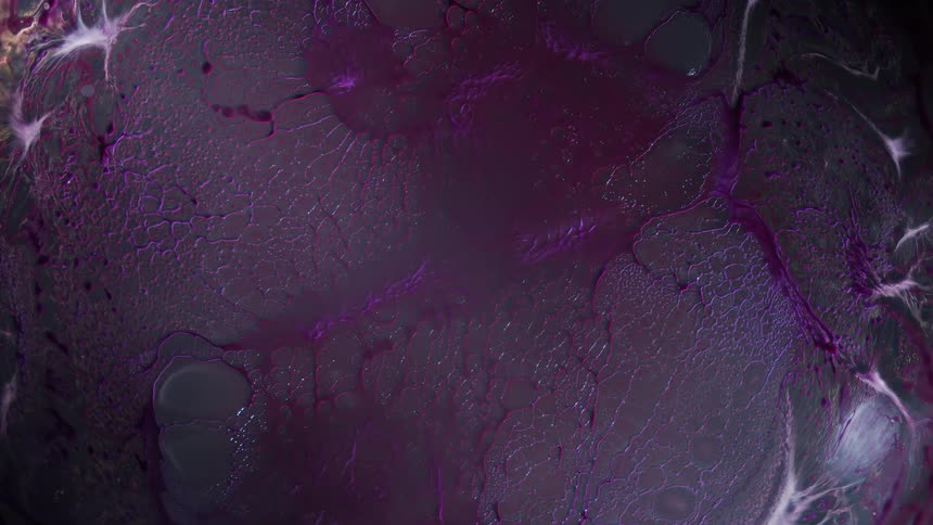 Expanding purple substance forms gray film filled with gas