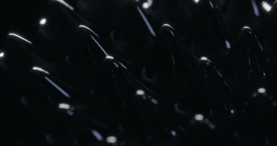 Black shiny liquid forming spikes
