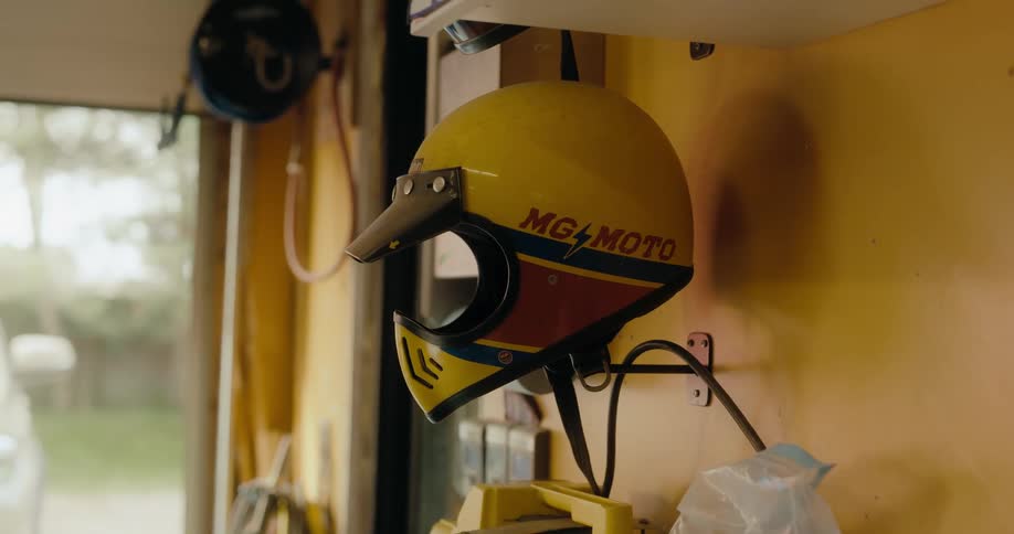 A race helmet on display in a garage
