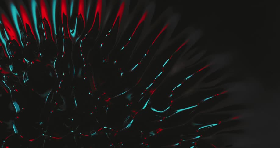 Rippling shiny black liquid