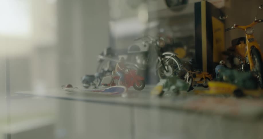 Toy motorcycles on a shelf