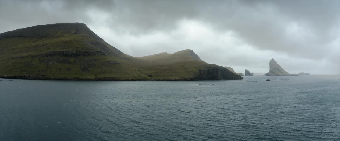 A view of an ocean and landscape is displayed