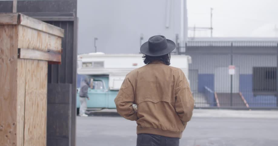 A person walks down the street