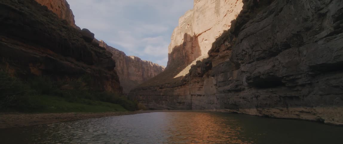 A river flowing through a rocky canyon in nature