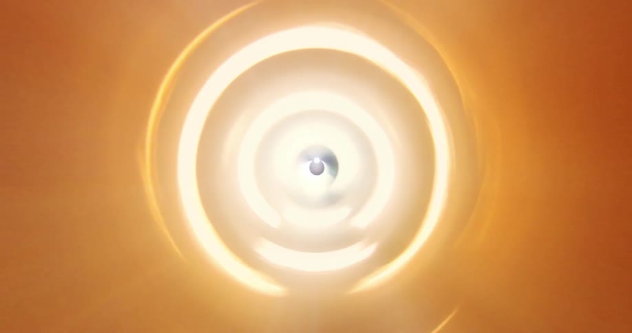 Bright light shines on walls of cylinder before illuminating the dark