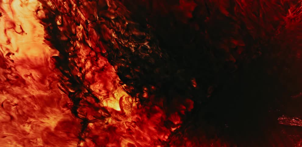 A graphic design mimics the look of lava spilling downward