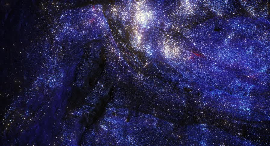 A surreal purple galaxy with twinkling stars