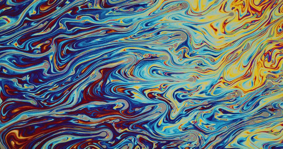 Liquid colors are displayed in the graphic design