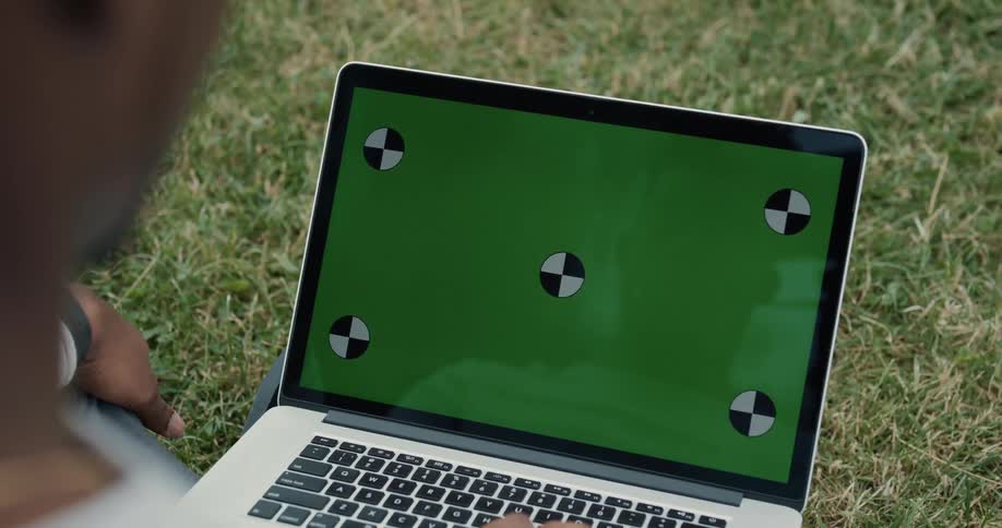 A person is typing on the laptop