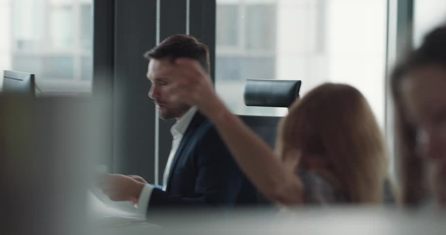 People are working in the office together