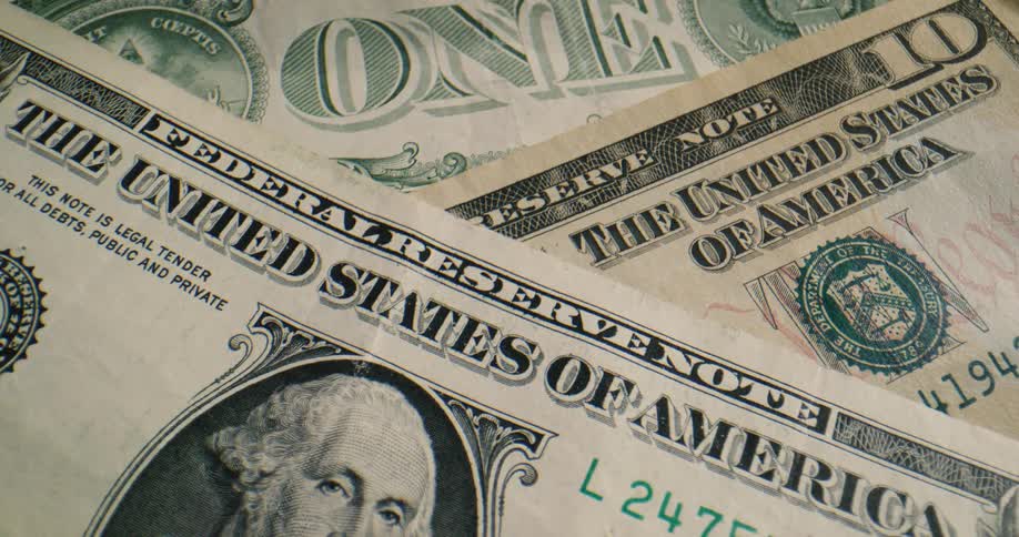 A pile of american bank notes