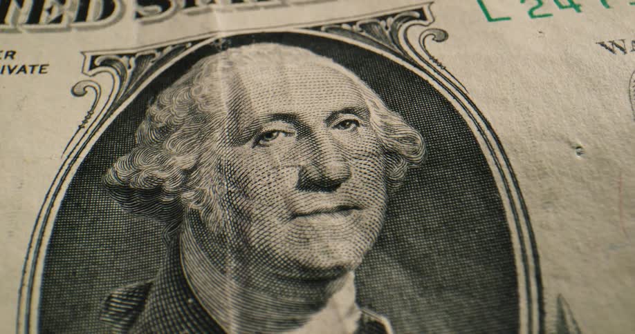 Text and artwork on the face of an american banknote