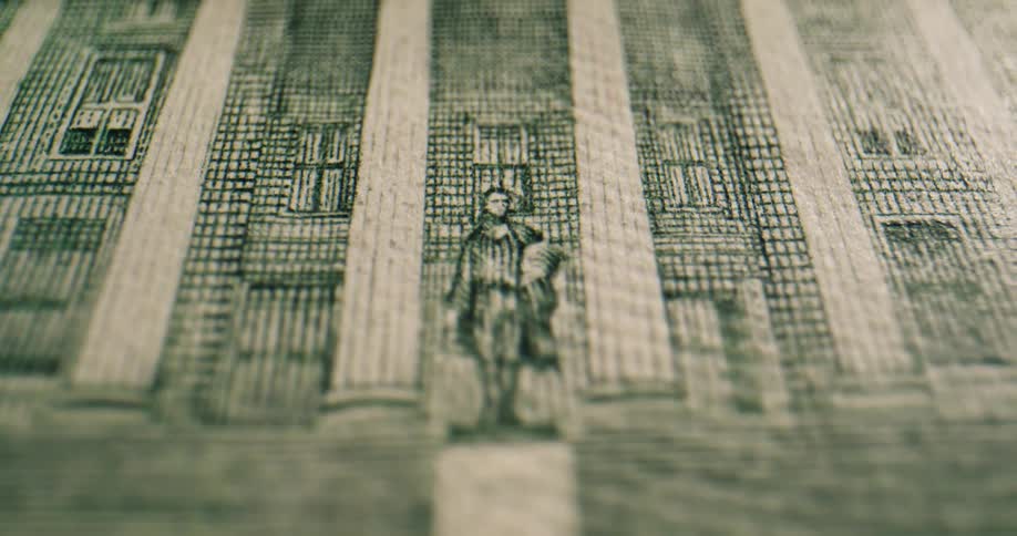 Threads are visible on the back of us currency