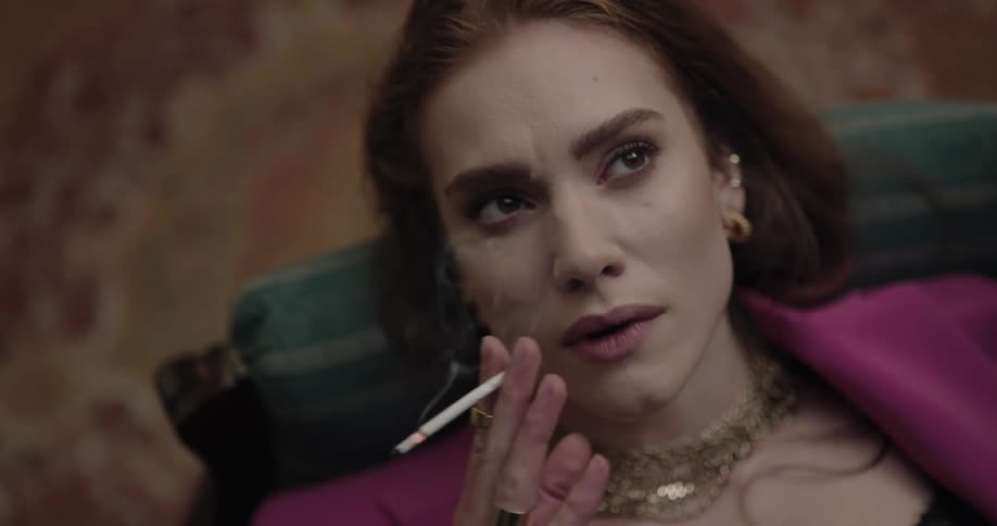 A woman is smoking a cigarette