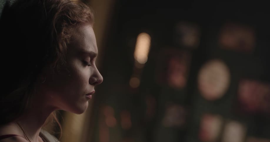 Distressed face of a young redhead woman