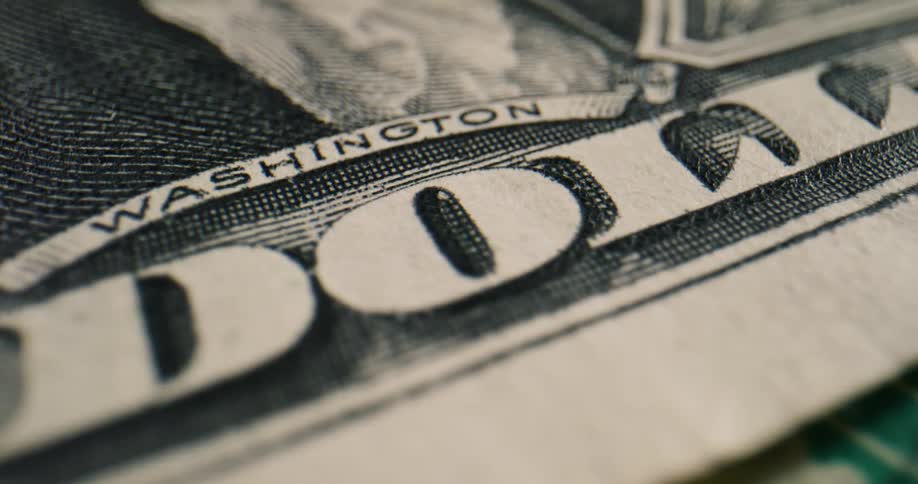 Close up view of a dollar bill is displayed