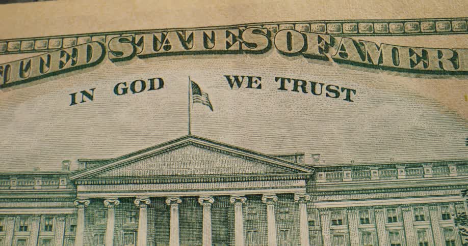 Artwork and text on the back of an american bank note