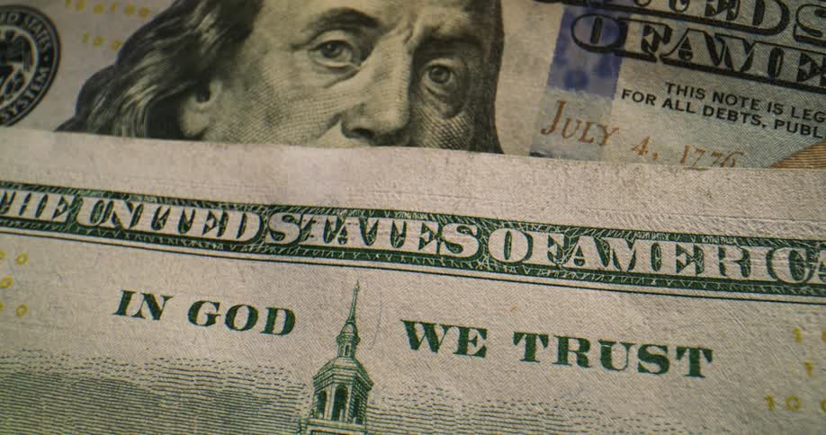 The front and back of a us one hundred dollar bill