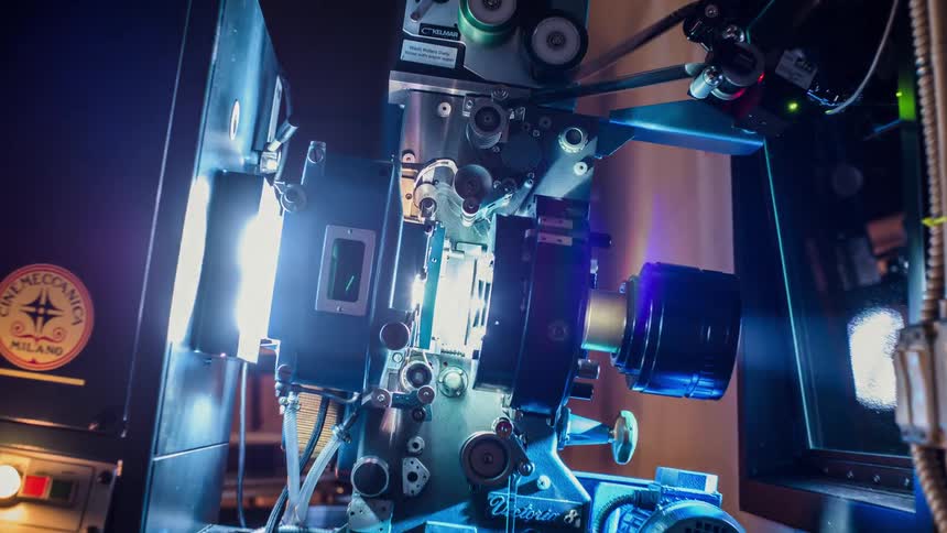 The projector is displaying film