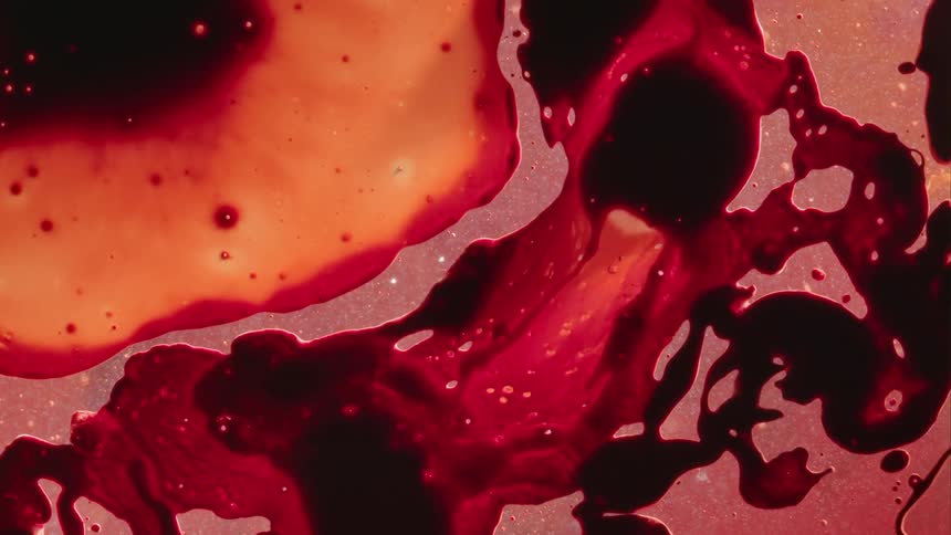 The blood mixes with the water