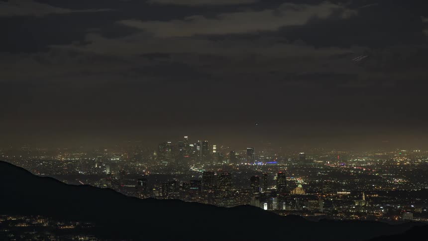 The city is brightly lit at night