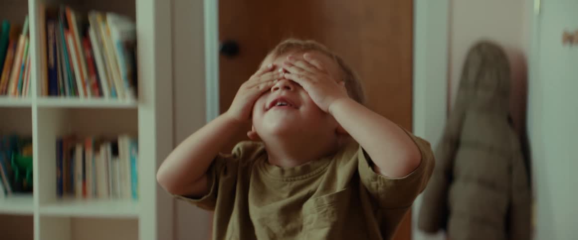 Mother and son are playing and laughing together