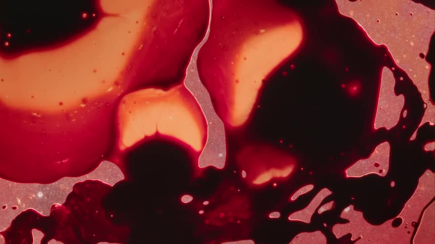 Red yellow and black paint spreading