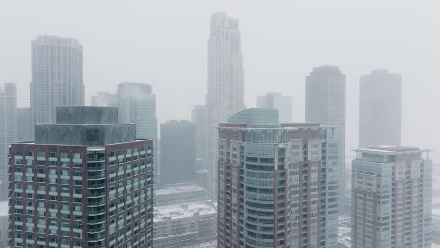 Snow continues to fall in Chicago