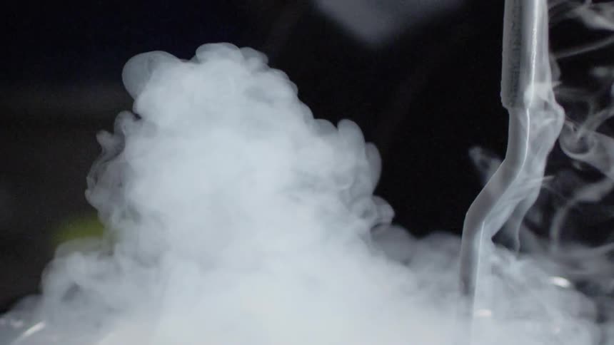 Steam is rising from a metal cylinder