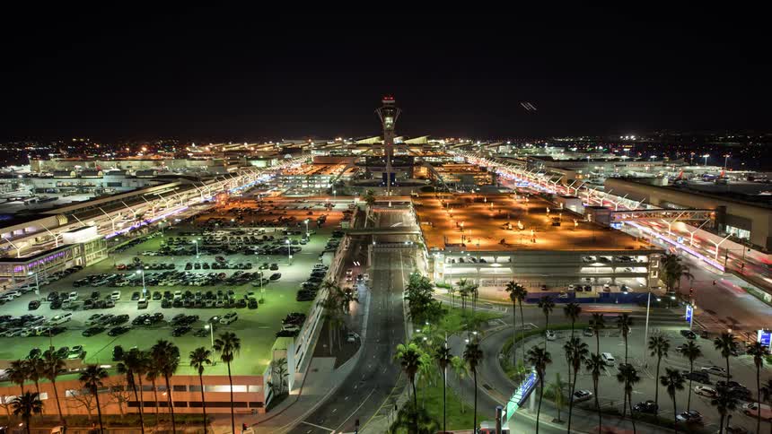 Time lapse of vehicles driving from up high at LAX airport