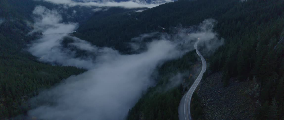 Vehicle headlights under dense layer of fog