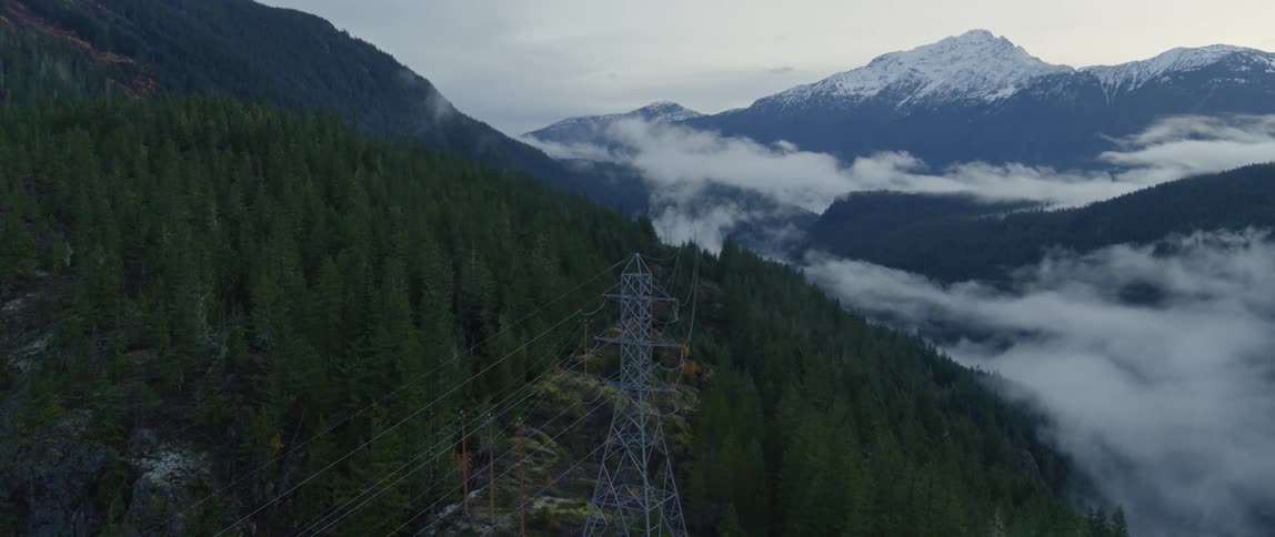 Cell tower sit between mountains