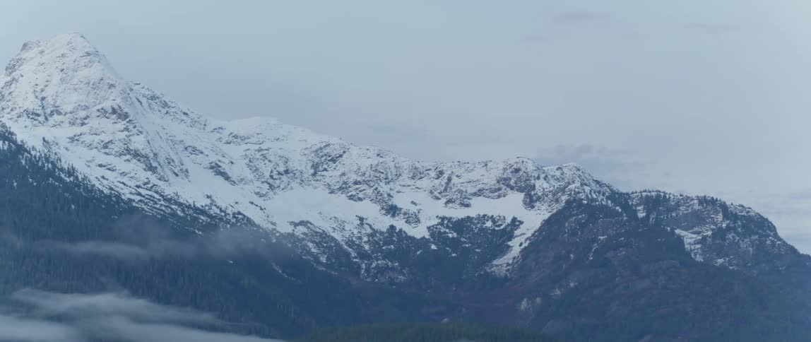 A snow covered mountain ridge