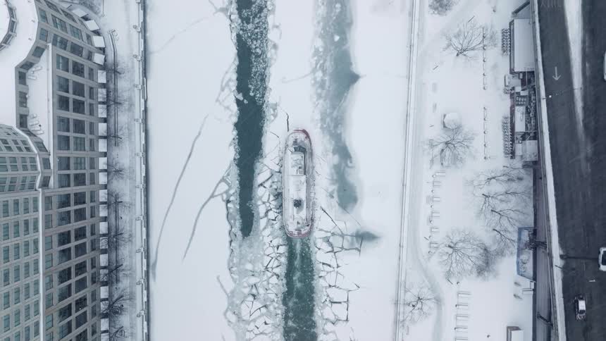 Aerial view icebreaker boat in the Chicago River