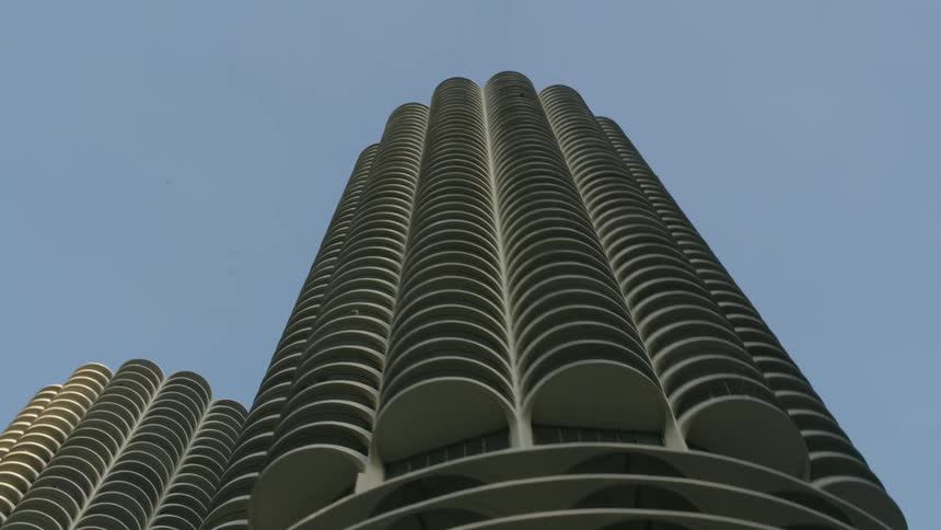 Two modern skyscrapers reach high into the sky