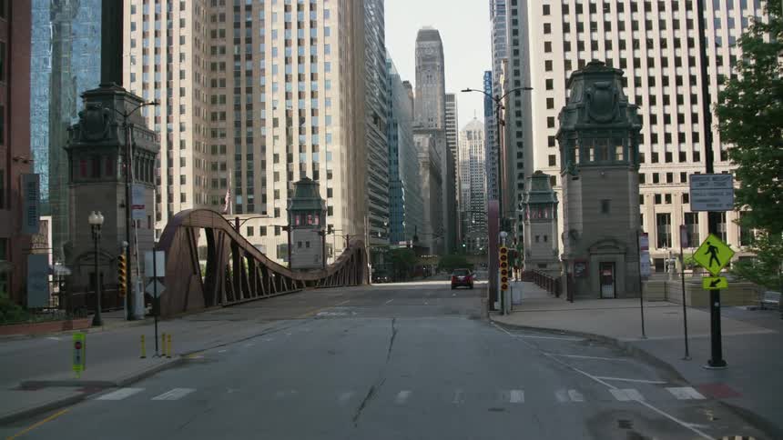 A car crossing over the dusable drawbridge on michigan ave in chicago