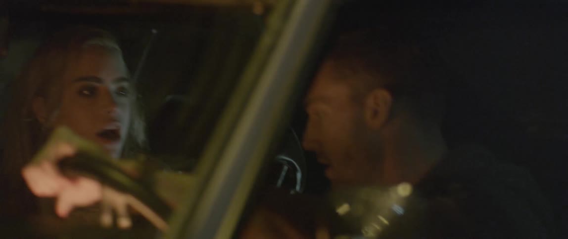 A man and woman in a car argue as he speeds off