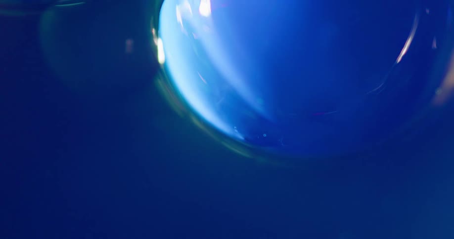 A blue orb brightens and lightens with light