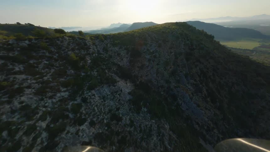 Aerial view of the slopes of a mountain range at morning