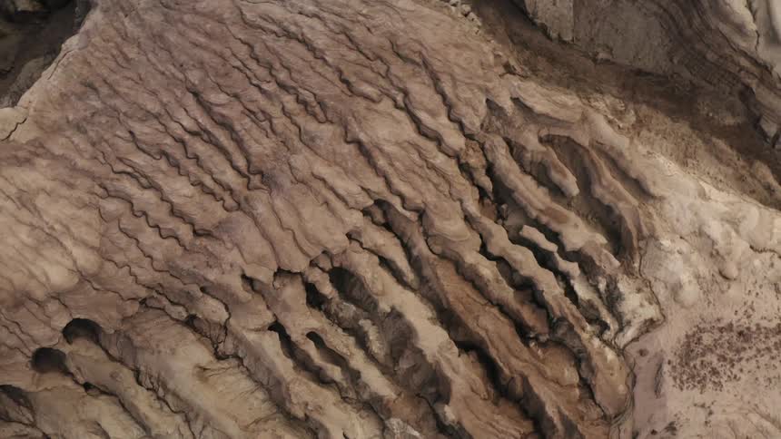 A path runs through the cavern