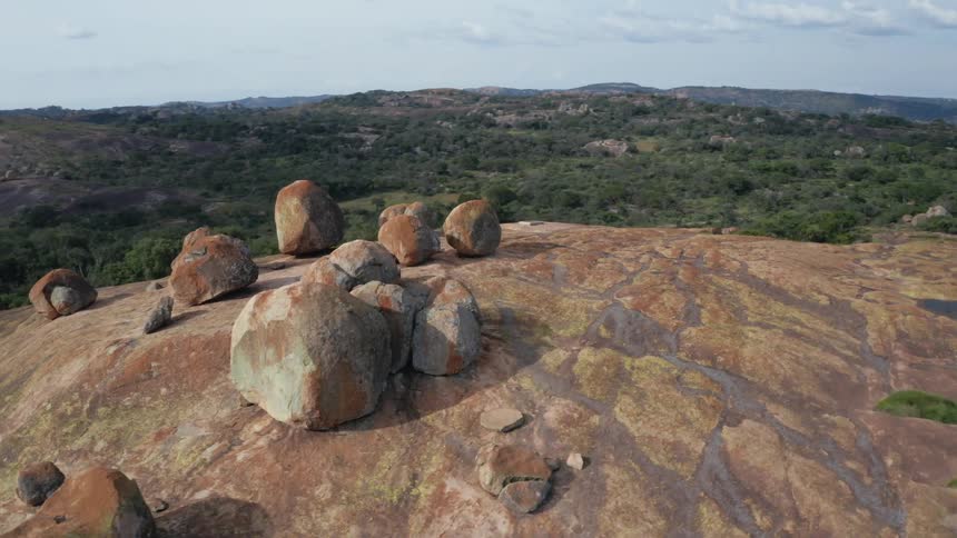 Aerial of massive boulders on rocky mountaintop