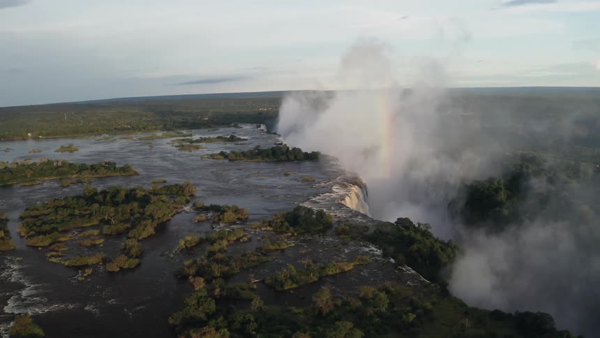 Aerial view of land and a water resource is displayed